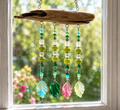 Whispers of Spring driftwood suncatcher handcrafted one-of-a-kind